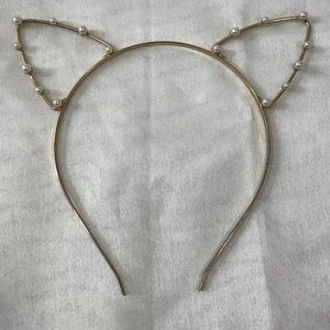 Pearl Cat eats headband